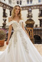 wedding dress with off the shoulders and long train