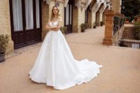 ball gown wedding dress with transparent back and long train